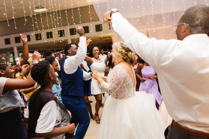 African American Groom with Real Bride Dancing at Wedding Reception in Florida