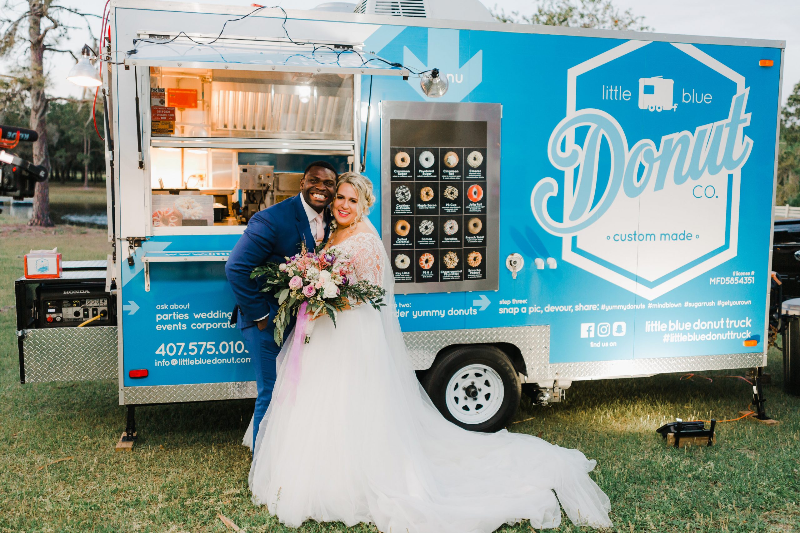 Bride and Groom in Front of Unique Donut Truck at Real Wedding