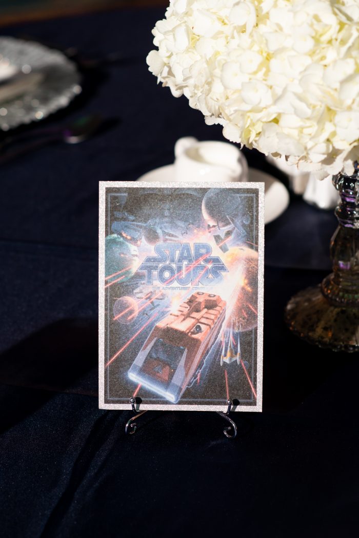 Disney Themed Table with Star Tours Ride Fast Pass at Disney World Wedding Reception at the Grand Floridian