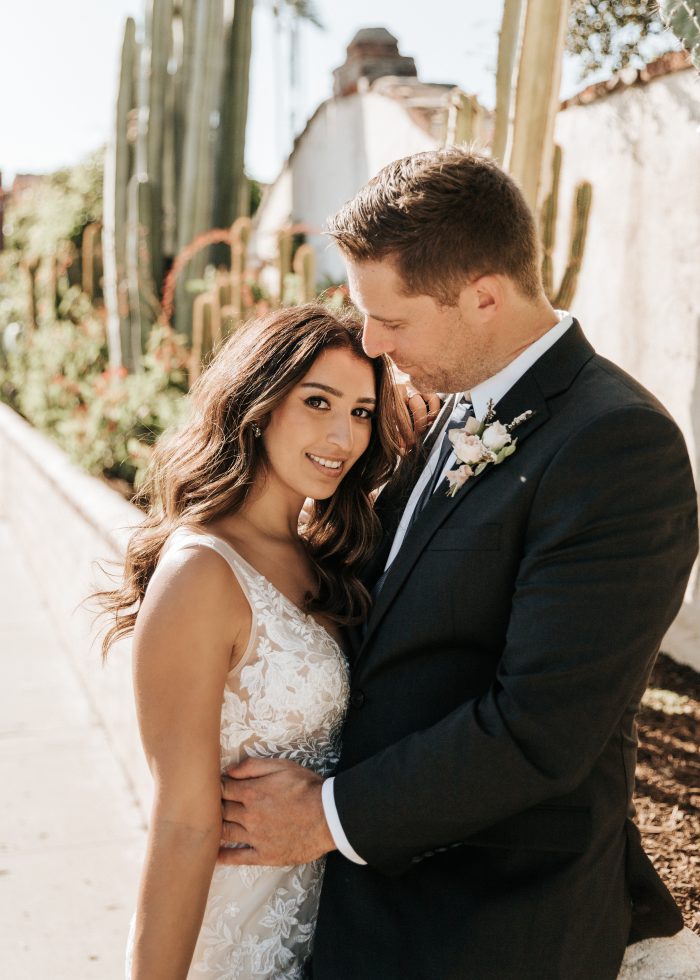 Bride In Fit-And-Flare Wedding Dress Called Greenley By Maggie Sottero With Curled Hairstyle