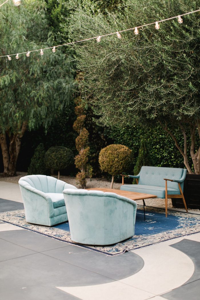 Blue Cushioned Seats for Guests at Outdoor Reception