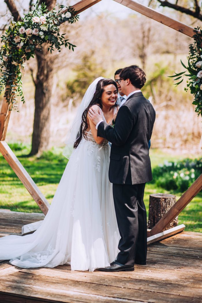 Bride In Lace Wedding Dress Called Raelynn With Groom