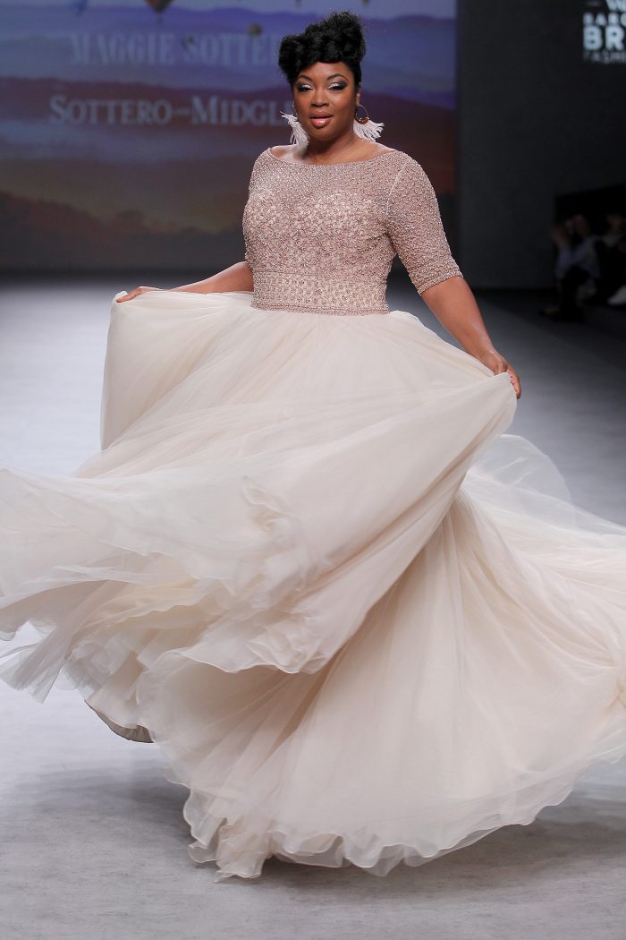 Plus Size Black Model Wearing Vintage Ball Gown Wedding Dress Called Allen by Sottero and Midgley