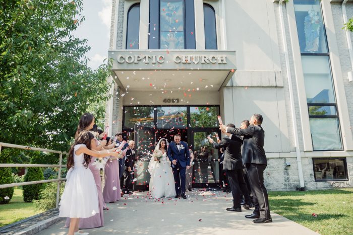 Bride and Groom Walking Out of Church at Egyptian Multicultural Wedding