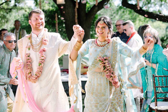 Groom with Indian Bride at Traditional Hindu Wedding Ceremony