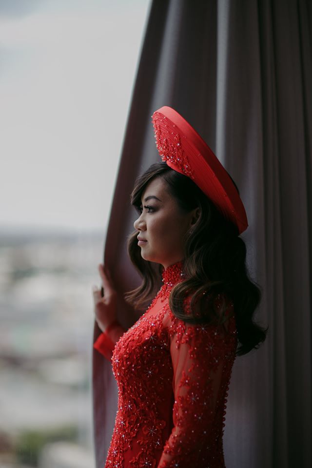 Bride Wearing Red Wedding Dress and Hat for Traditional Chinese Wedding