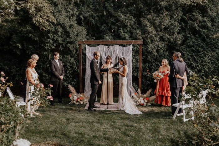 Groom with Real Bride During Backyard Elopement Ceremony with Immediate Family