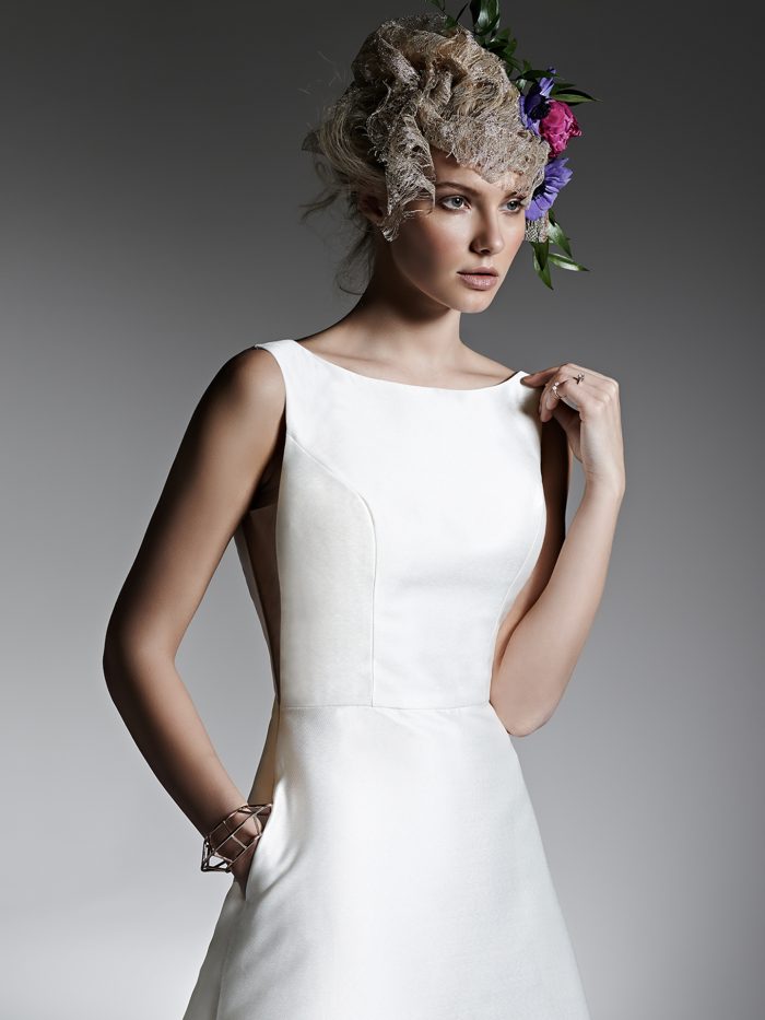 Model Wearing Simple Satin Short Wedding Dress Called McCall Lane by Sottero and Midgley