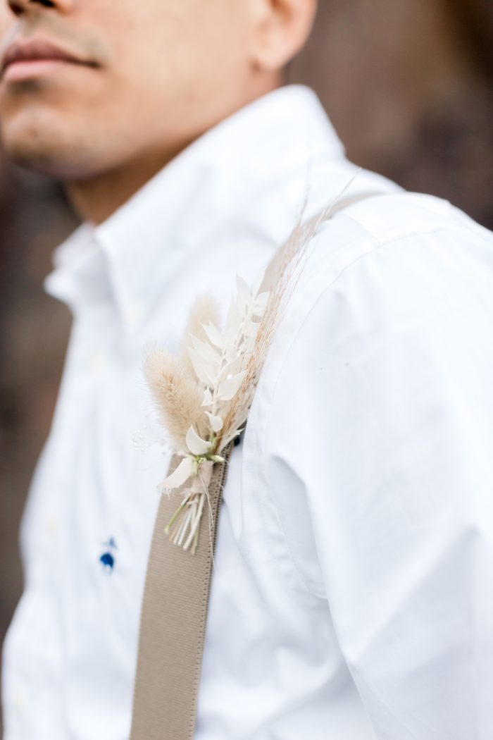 Groom Wearing Floral Boutonniere for Casual Groom's Wedding Attire 