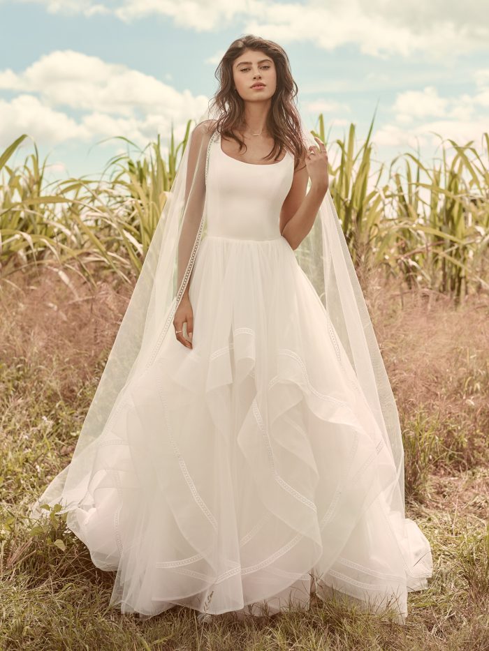 Model Wearing Minimalist Dreamy Ball Gown Wedding Dress Called Rosemary by Rebecca Ingram