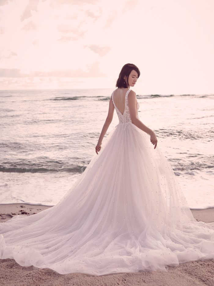 Model Wearing Dreamy Boho Beaded Wedding Dress Called Pierce by Sottero and Midgley