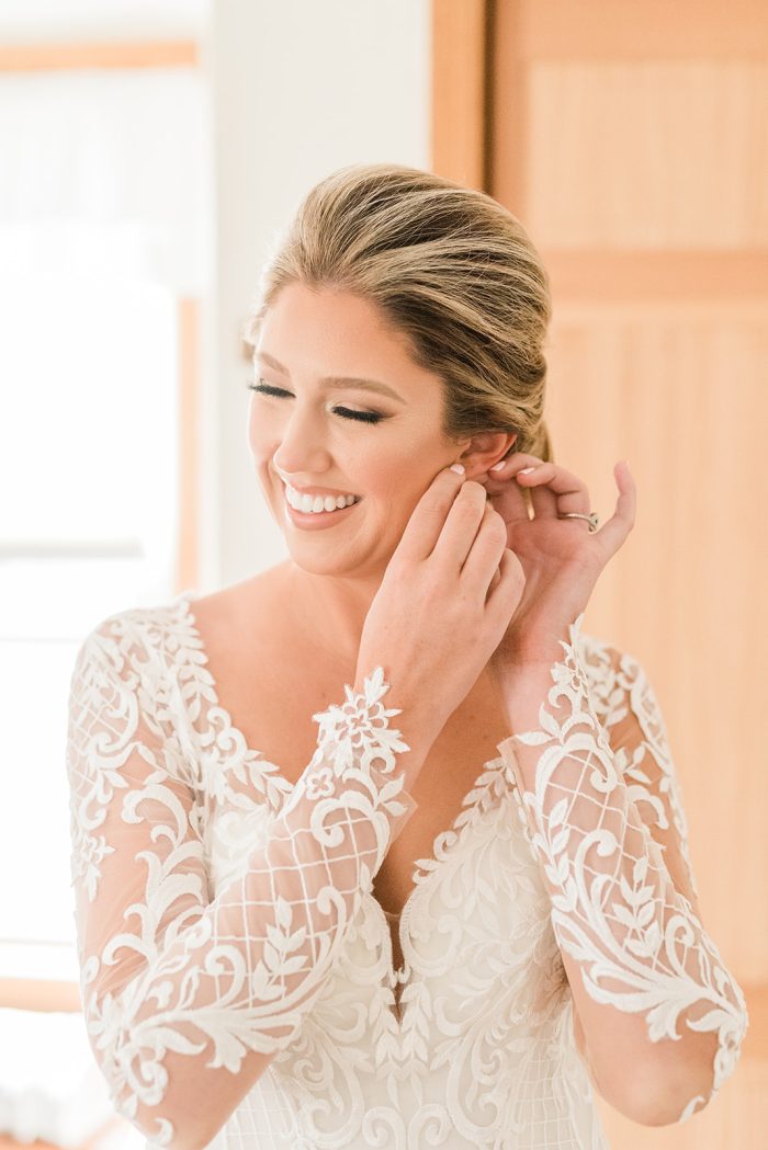 Bride Getting Ready For Her Wedding Wearing A Dress Called Dakota By Maggie Sottero