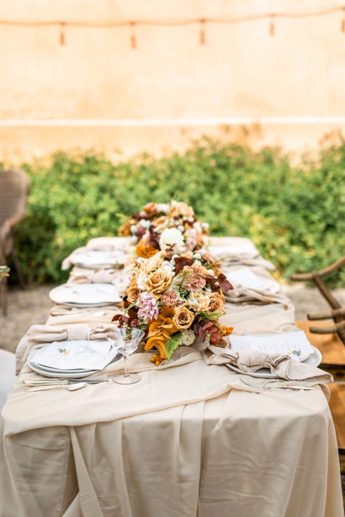 Table Settings with Rustic Floral Centerpieces for Tuscan-Inspired Wedding