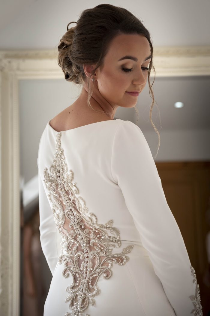 Winter Wedding Dress With Bride Wearing Aston By Sottero And Midgley