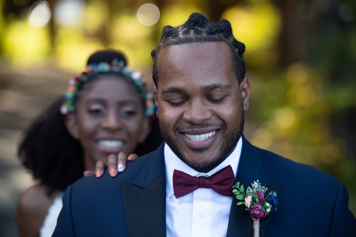 Black Bride Tapping Groom's Shoulder During First Look