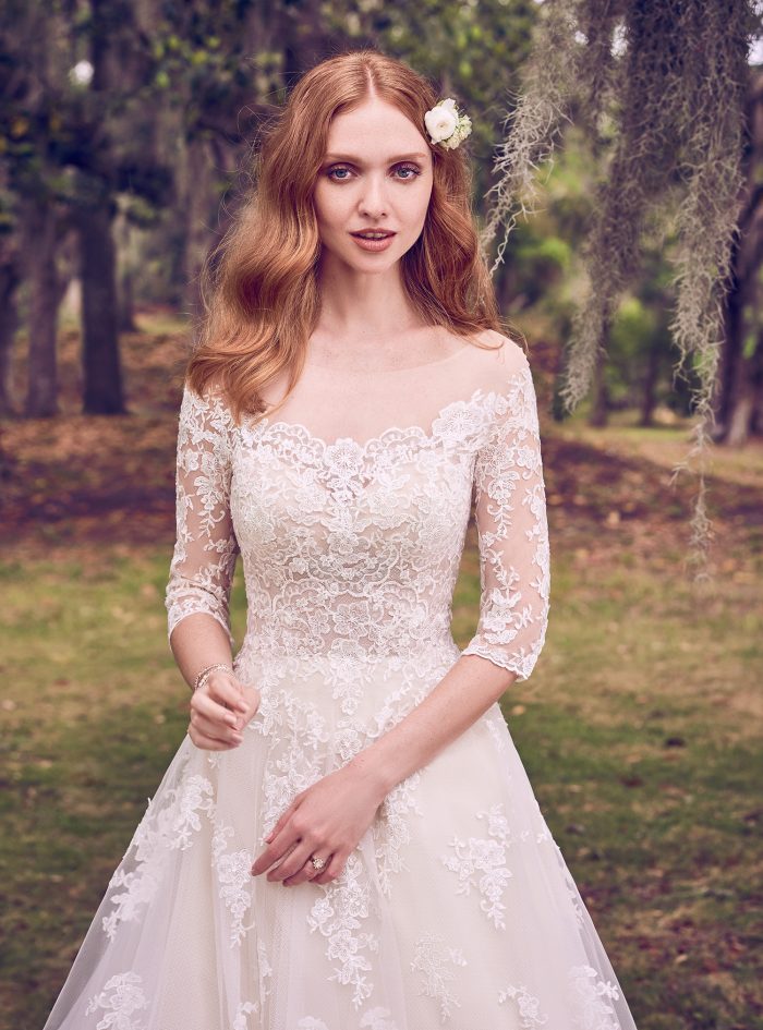 Model Wearing Off-the-Shoulder Lace A-line Wedding Gown Called Bree by Maggie Sottero