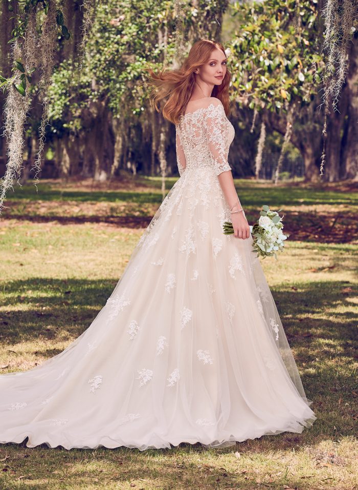 Model Wearing Off-the-Shoulder Lace A-line Wedding Gown Called Bree by Maggie Sottero