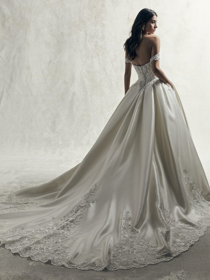 Model Wearing Luxe Satin Ball Gown Wedding Dress with Off-the-Shoulder Sleeves Called Kimora by Sottero and Midgley