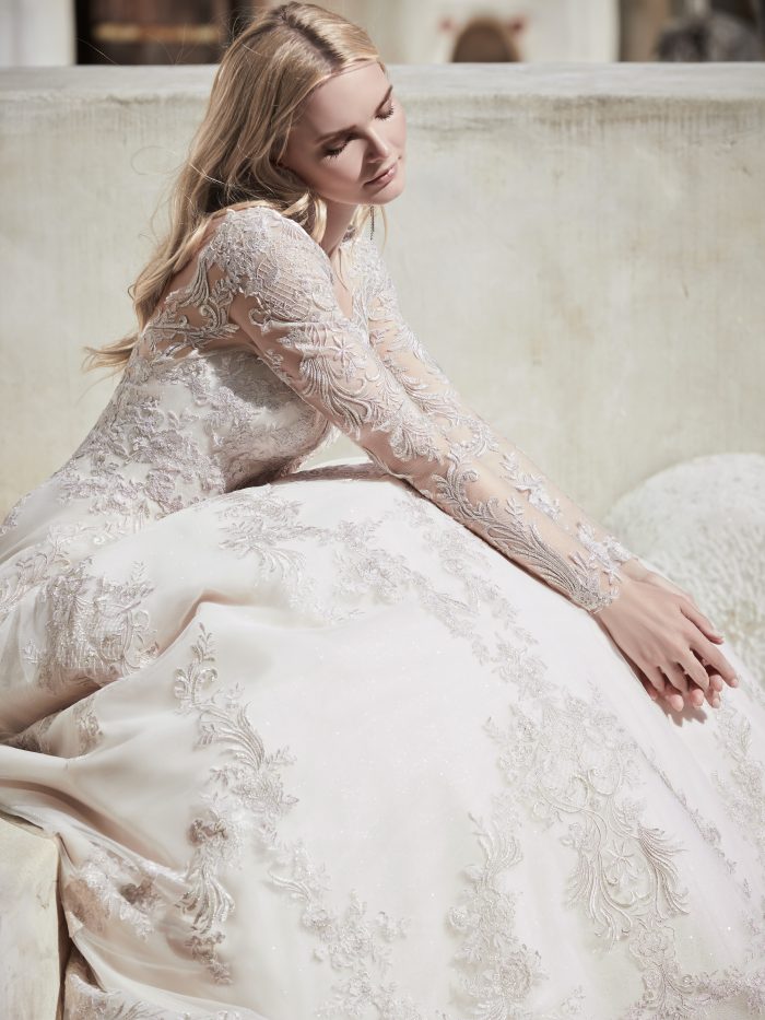 Bride Wearing Vintage Lace Long Sleeve Ball Gown Wedding Dress Called Vincent by Sottero and Midgley