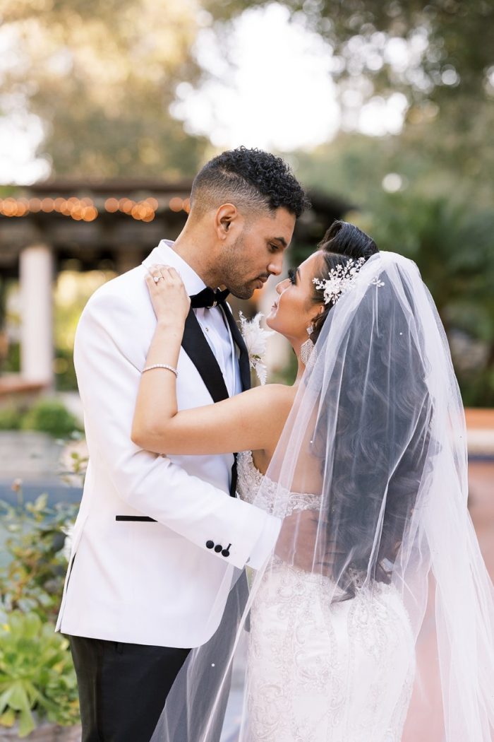 Groom with Real Bride Wearing Glamorous Satin Mermaid Wedding Dress Called Milena by Maggie Sottero