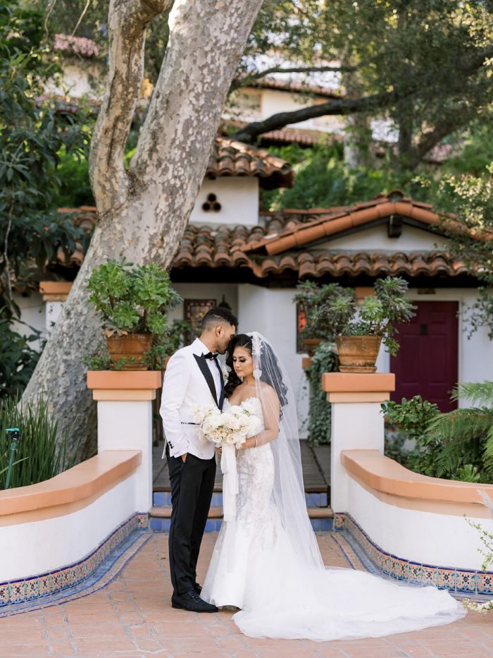 Groom with Real Bride Wearing Glamorous Satin Mermaid Wedding Dress Called Milena by Maggie Sottero