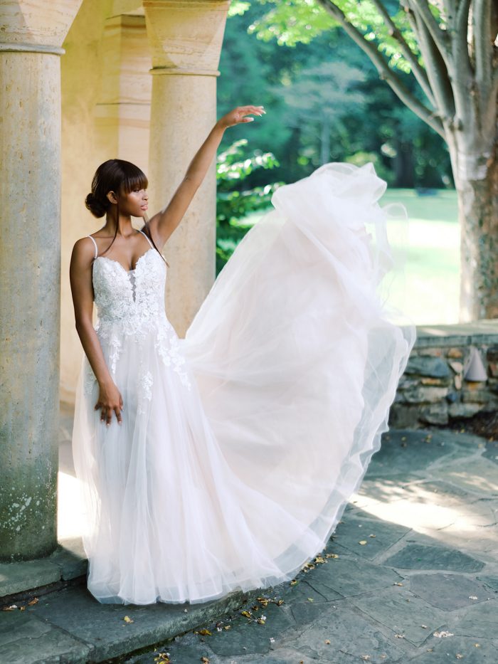 Black Model Wearing Whimsical Bohemian Wedding Dress Called Stevie by Maggie Sottero