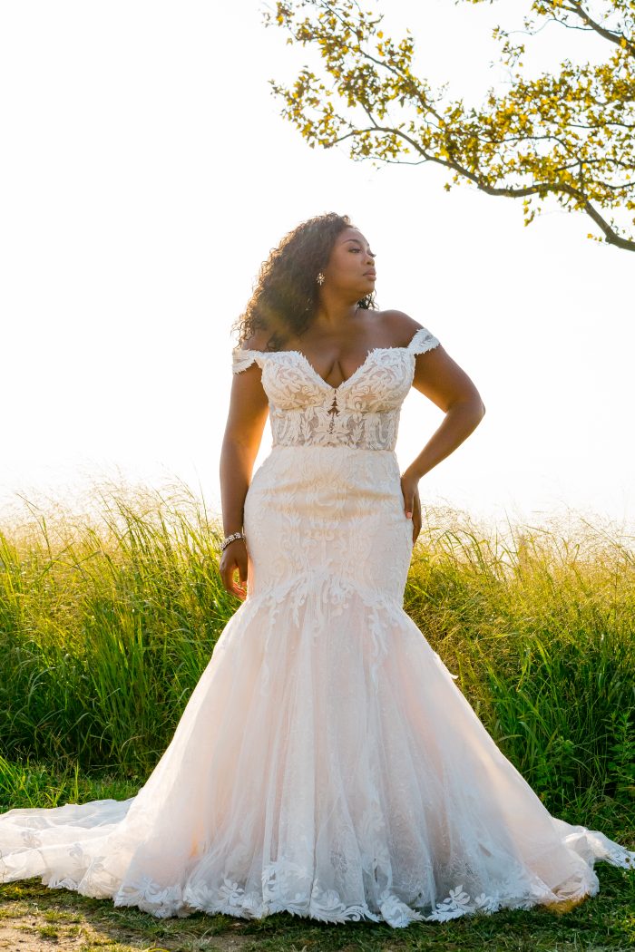 Black Plus Size Model Wearing Mermaid Wedding Dress Called Joss by Sottero and Midgley