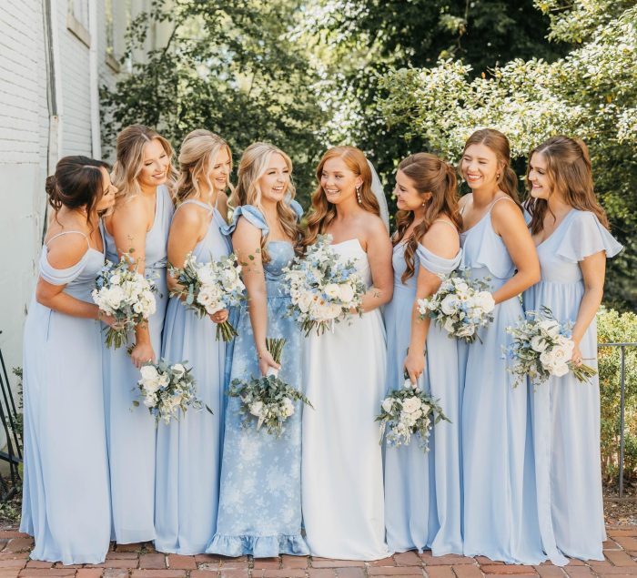 Bride wearing Aspen by Sottero and Midgley with her friends in blue