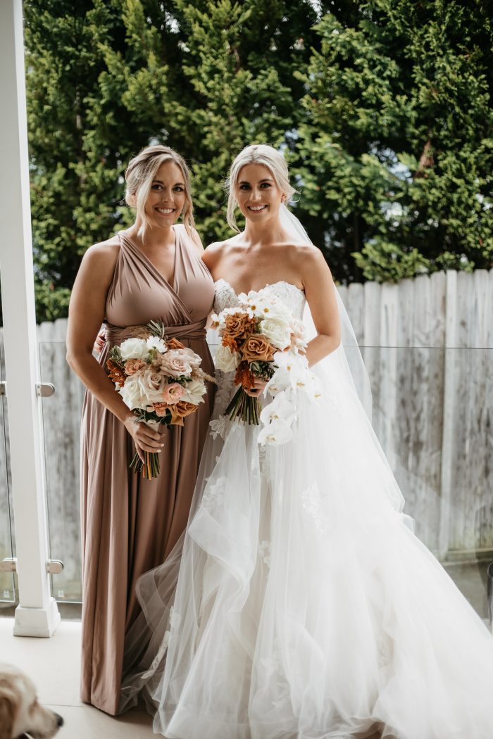 Bride wearing Indiana by Maggie Sottero with her mother