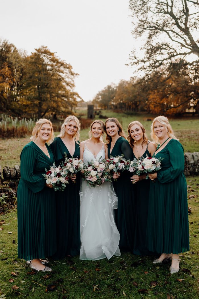 Bride wearing Lettie by Rebecca Ingram with her bridal party