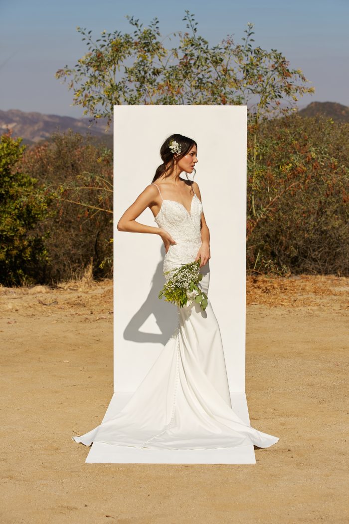 Model wearing simple sheath wedding dress Aubrey by Rebecca Ingram in a Spanish-Inspired Wedding Shoot