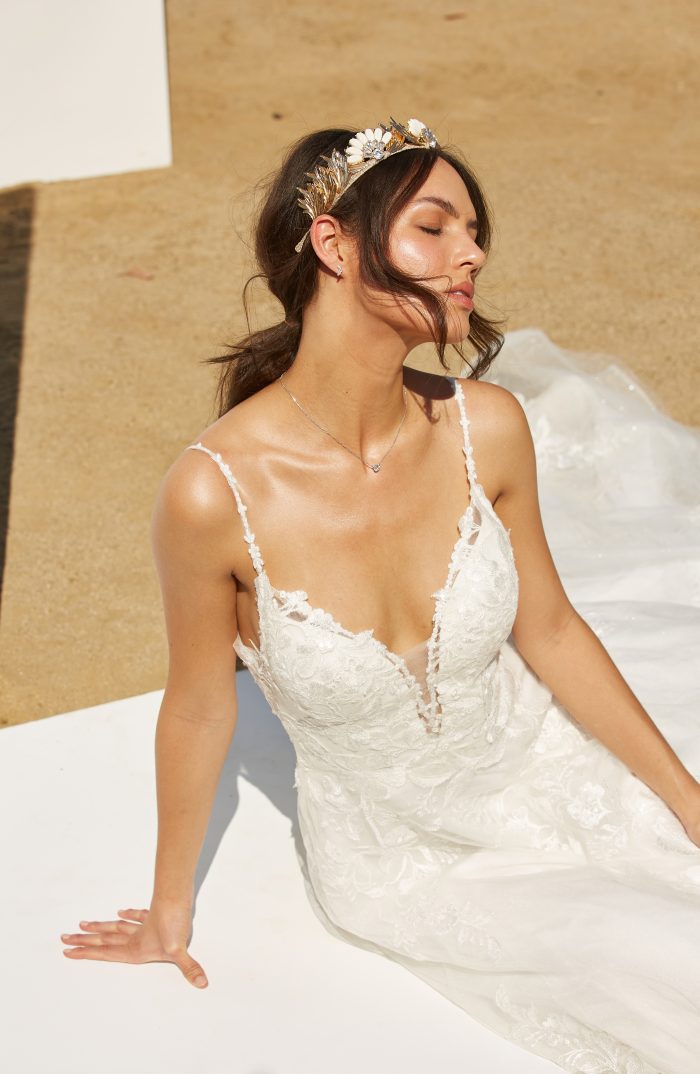 Model wearing lace A-line Wedding Dress Called Ellen by Rebecca Ingram in a Spanish-inspired Wedding Shoot