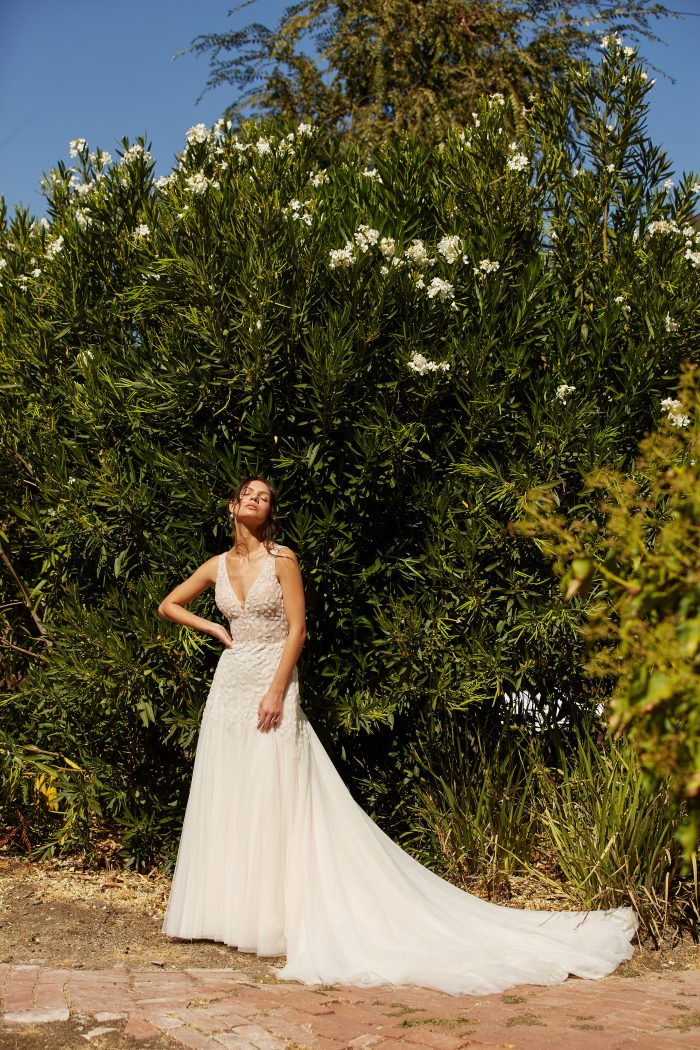 Model wearing Lace Fit-and-Flare Wedding Dress called Geneva by Maggie Sottero in a Spanish-inspired Wedding Shoot