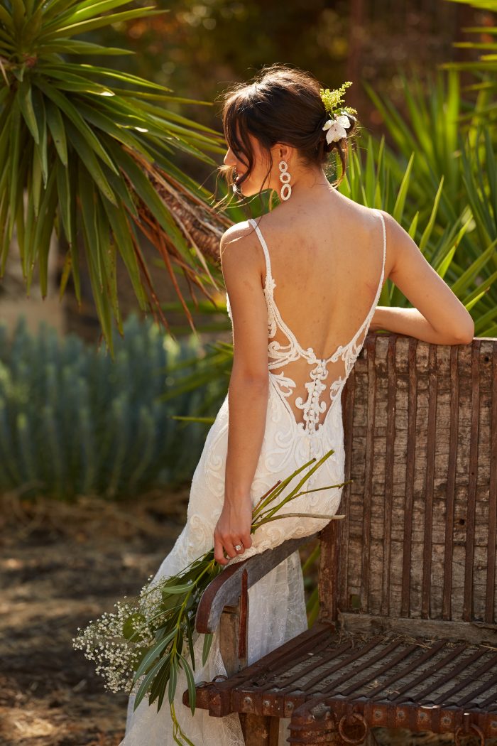 Model wearing Sexy Low-back Wedding Dress called Esther by Maggie Sottero in a Spanish-inspired Wedding Shoot