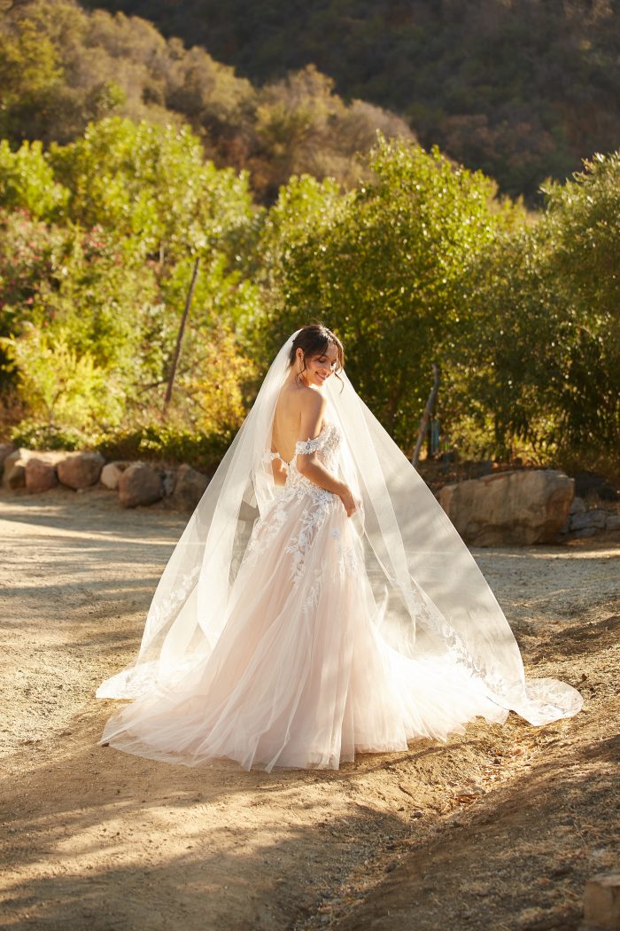 Model wearing Princess Wedding Dress called Orlanda by Maggie Sottero in a Spanish-inspired Wedding Shoot
