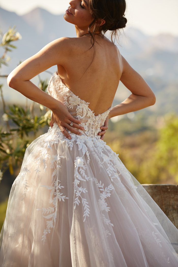 Model wearing Princess Wedding Dress called Orlanda by Maggie Sottero in a Spanish-inspired Wedding Shoot