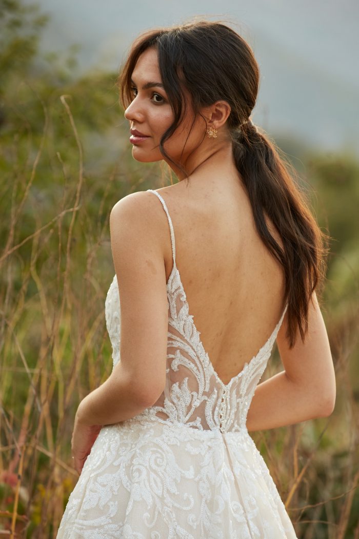 Model wearing Lace A-line Wedding Dress called Presley by Sottero and Midgley in a Spanish-inspired Wedding Shoot