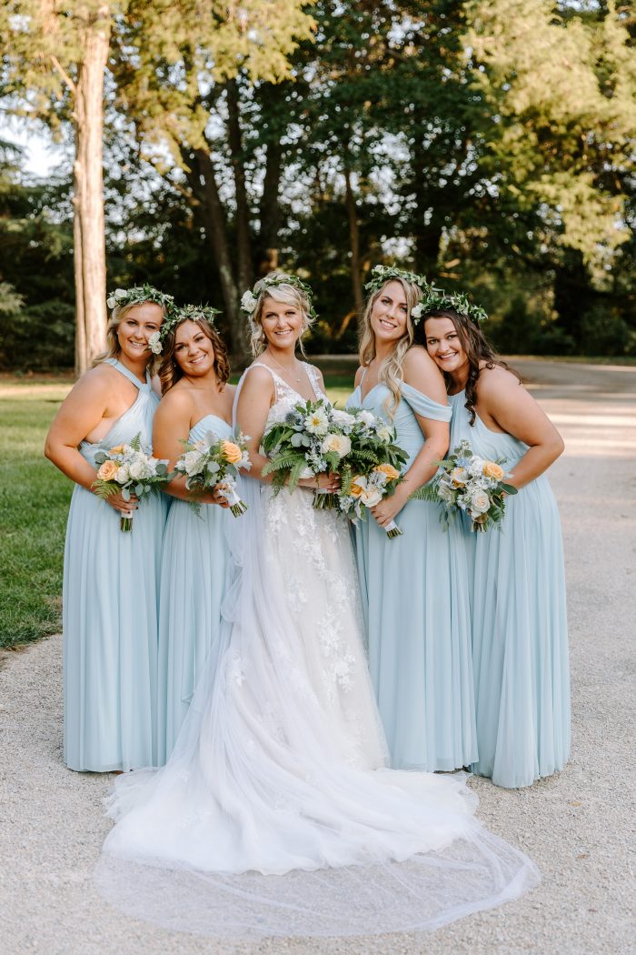 Real Bride Wearing Meryl Wedding Dress with Bridesmaids Wearing Blue Dresses for Summer Wedding