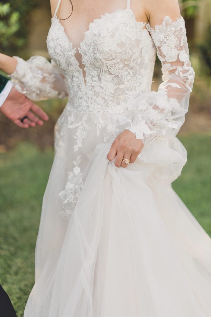 Bride Wearing Lace A-line Wedding Dress with Bishop Sleeves Called Stevie by Maggie Sottero