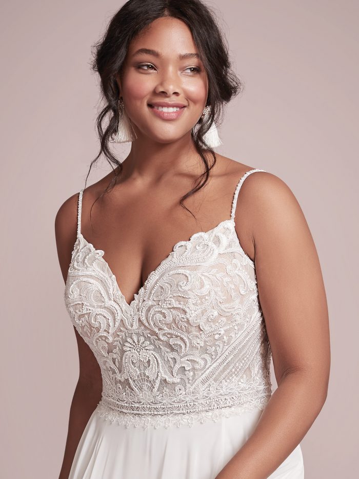 Model wearing Chiffon Sheath Beachy Wedding Dress Lorraine by Rebecca Ingram