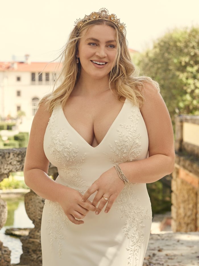 Bride Wearing Sexy Crepe Wedding Dress for Apple Shape Body Types Called Adrianna by Maggie Sottero