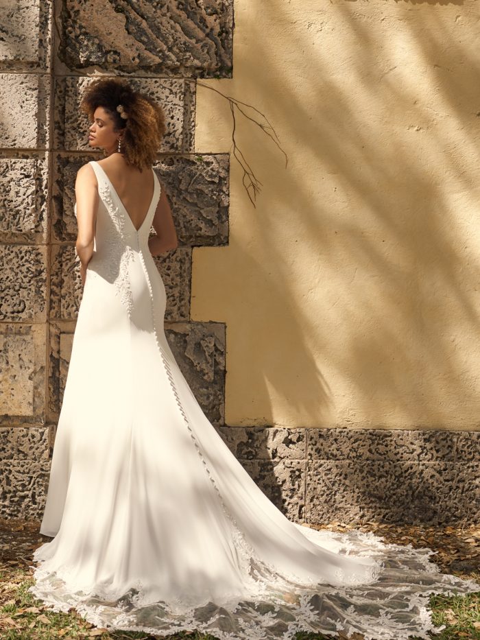 Bride Wearing V-back Crepe Wedding Gown Called Adrianna by Maggie Sottero