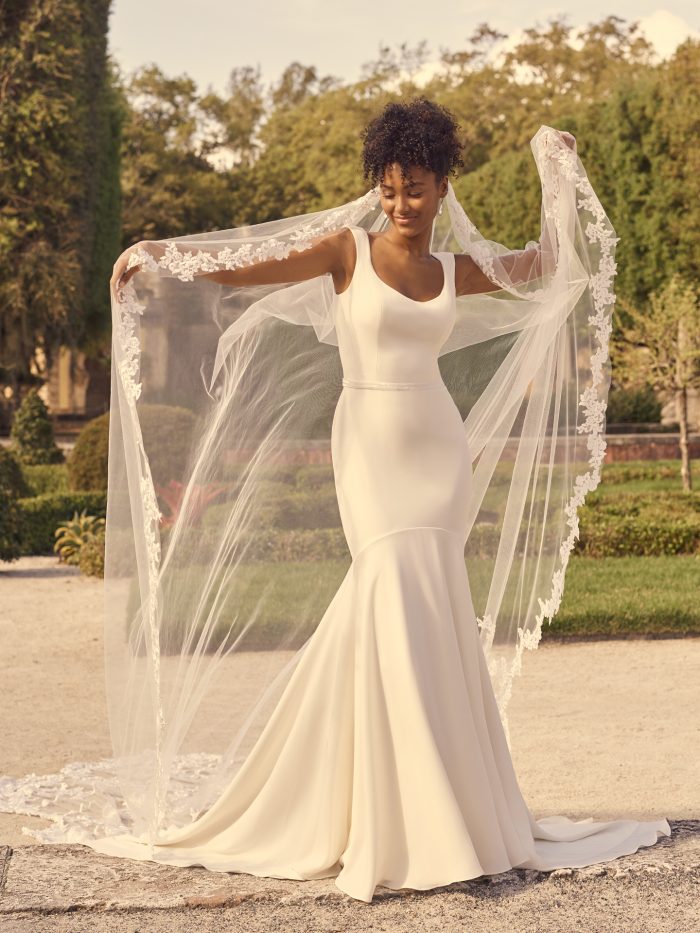 Bride Wearing Minimalist Crepe Wedding Gown with Tank Straps Called Astley by Maggie Sottero