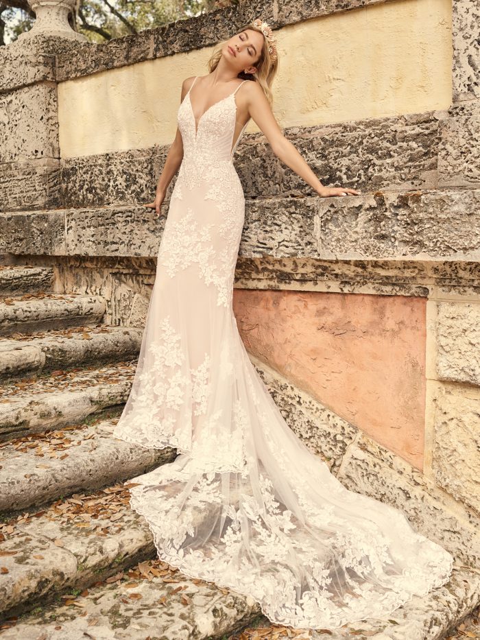Bride Wearing Lace Sheath Wedding Dress with a Long Wedding Dress Train Called Fontaine by Maggie Sottero