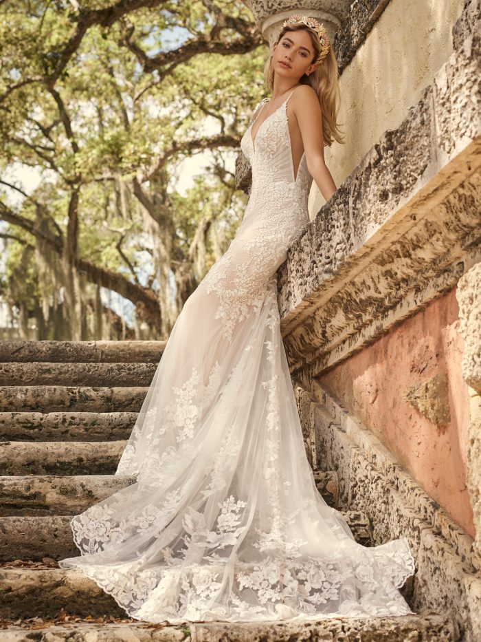 Blonde Bride Wearing A Wedding Dress Called Fontaine By Maggie Sottero On Stairs