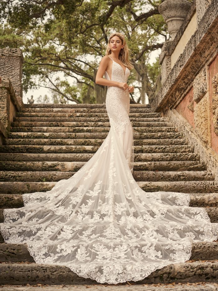 Bride Wearing Lace Sheath Wedding Dress with a Long Wedding Dress Train Called Fontaine by Maggie Sottero