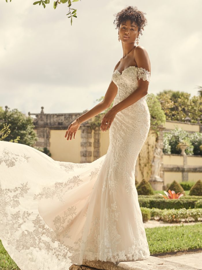 Bride Wearing Off-the-Shoulder Bridal Gown with Long Train Called Katell by Maggie Sottero
