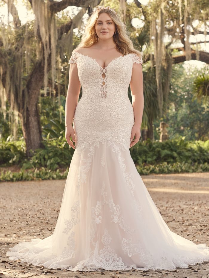 Wedding Dress Trends With Bride Wearing Sexy Cutouts In A Dress Called Keeva By Maggie Sottero