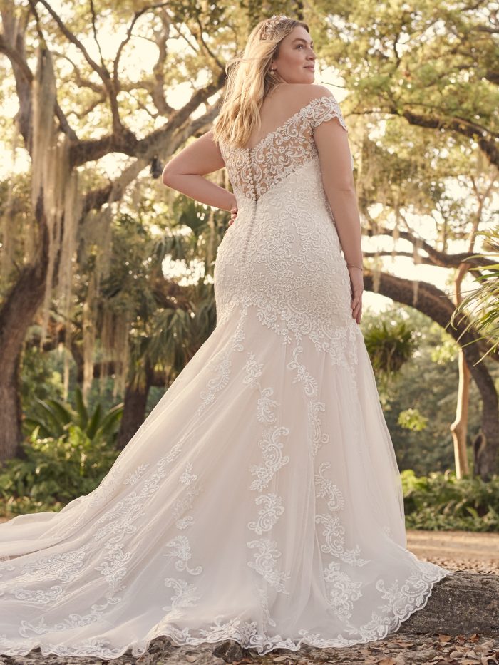 Wedding Dress Trends With Bride Wearing Sexy Cutouts In A Dress Called Keeva By Maggie Sottero