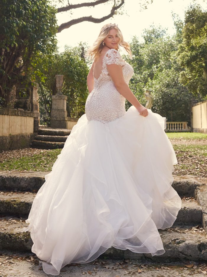 Bride Wearing Plus-Size Trumpet Wedding Dress Called Lunaria by Maggie Sottero